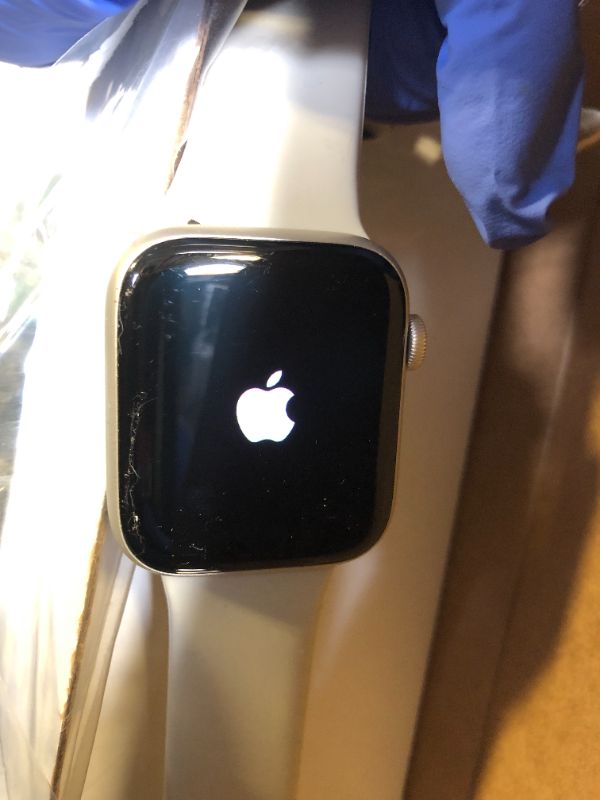 Photo 1 of Apple Watch SE (2nd Gen) (GPS, 44mm) - Starlight Aluminum Case with Starlight Sport Band, M/L (Renewed)