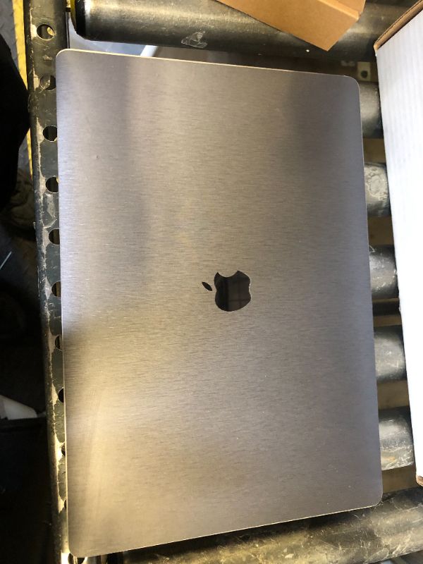 Photo 1 of 2017 Apple MacBook Pro with 3.1GHz Intel Core i7 (15-inch, 16GB RAM, 1TB Storage) Space Gray (Renewed)