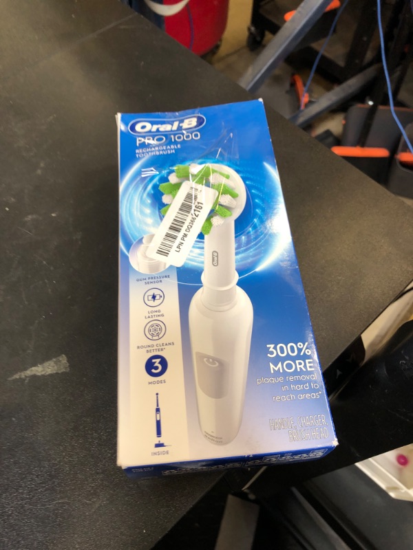 Photo 1 of Oral-B Pro 1000 Rechargeable Electric Toothbrush, White