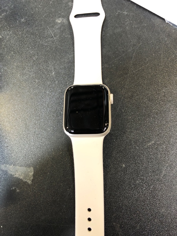 Photo 1 of Apple Watch SE (2nd Gen) (GPS, 40mm) - Starlight Aluminum Case with Starlight Sport Band, M/L (Renewed)