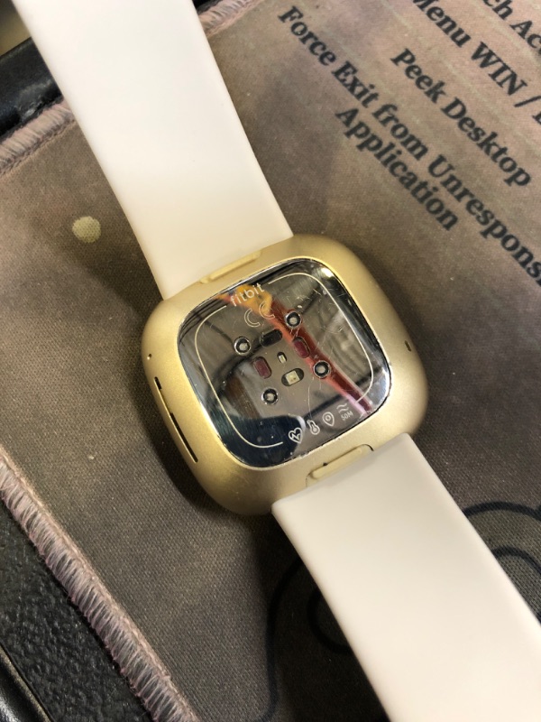 Photo 1 of Fitbit Sense Advanced Smartwatch with Tools for Heart Health, Stress Management & Skin Temperature Trends, White/Gold, One Size (S & L Bands Included)