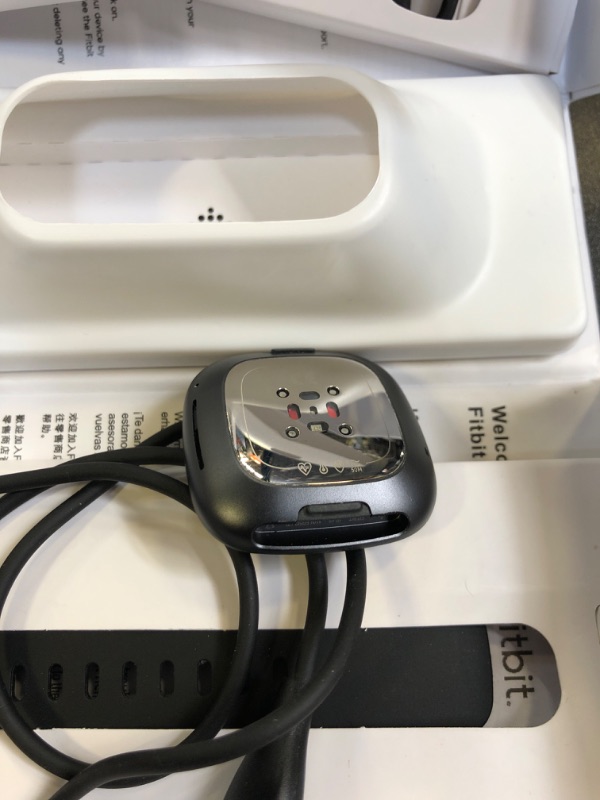 Photo 1 of Fitbit Sense Advanced Smartwatch with Tools for Heart Health, Stress Management & Skin Temperature Trends, Carbon/Graphite, One Size (S & L Bands Included)