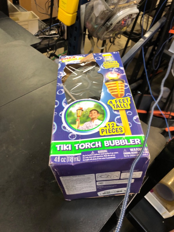 Photo 1 of Tiki Torch Bubbler - Bubble Machine with Lights and Music, Bubble Blower and Wand, Rechargable Outdoor Toy for Kids Teens Adults, 4 Feet Tall, Includes 4oz Bubble Solution