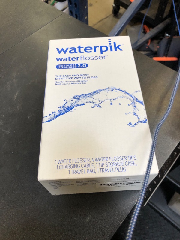 Photo 1 of Waterpik Cordless Advanced 2.0 Water Flosser For Teeth, Gums, Braces, Dental Care With Travel Bag and 4 Tips, ADA Accepted, Rechargeable, Portable, and Waterproof, Blue WP-583, Packaging May Vary