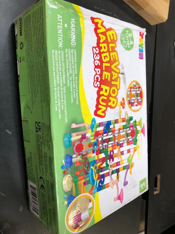 Photo 1 of JOYIN 236Pcs Glowing Marble Run with Motorized Elevator- Construction Building Blocks Toys with 30 Glow in The Dark Plastic Marbles, Easter STEM Gifts for Boys and Girls