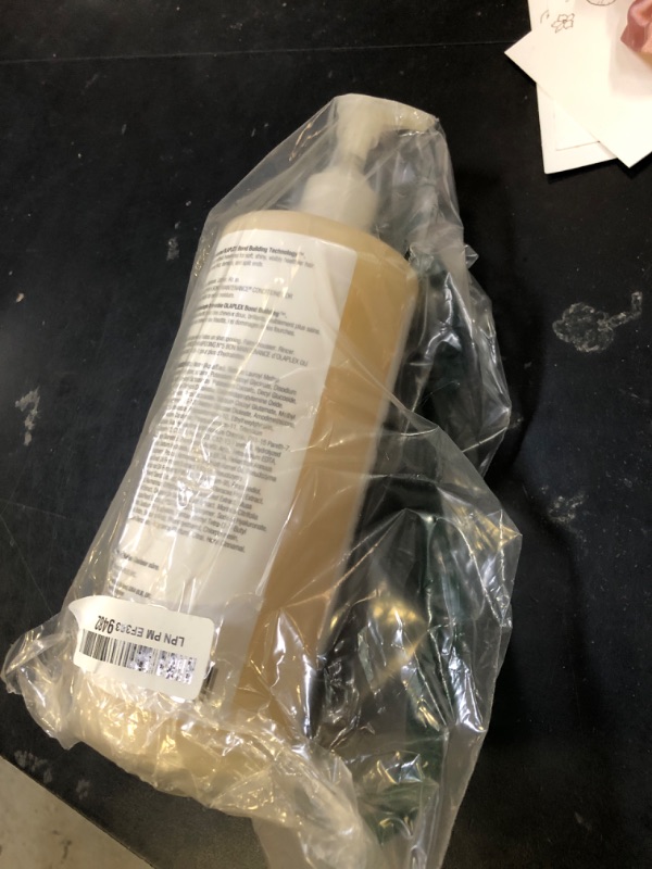 Photo 1 of Olaplex No. 4 Bond Maintenance Shampoo, Repairs, Strengthens, & Nourishes All Hair Types, Adds Shine & Leaves Hair Feeling Soft, 33.8 fl oz