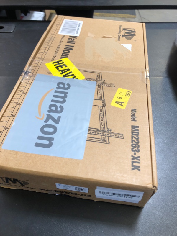 Photo 1 of Mounting Dream Tilting TV Wall Mount for 42-86" TV with Level Adjustment, Fits 16", 18", 24" Studs Easy TV Centering, Max VESA 800x400mm, 120 LBS Loading, MD2263-XLK