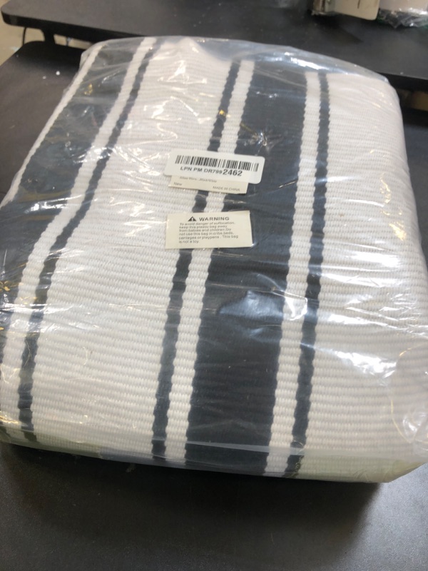 Photo 1 of Ailsan Black and White Outdoor Rug 5x7,Farmhouse Striped Large Patio Rug,Washable Front Porch Rug,Low Pile Cotton Layered Doormats Rug for Living Room Dining Room Indoor Outdoor Decor