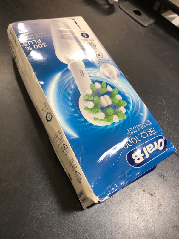Photo 1 of Oral-B Pro 1000 Rechargeable Electric Toothbrush, White
