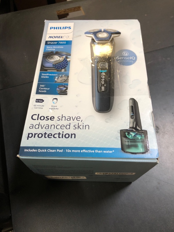 Photo 1 of Philips Norelco Shaver 7800, Rechargeable Wet & Dry Electric Shaver with SenseIQ Technology, Quick Clean Pod, Charging Stand, Travel Case and Pop-up Trimmer, S7885/85