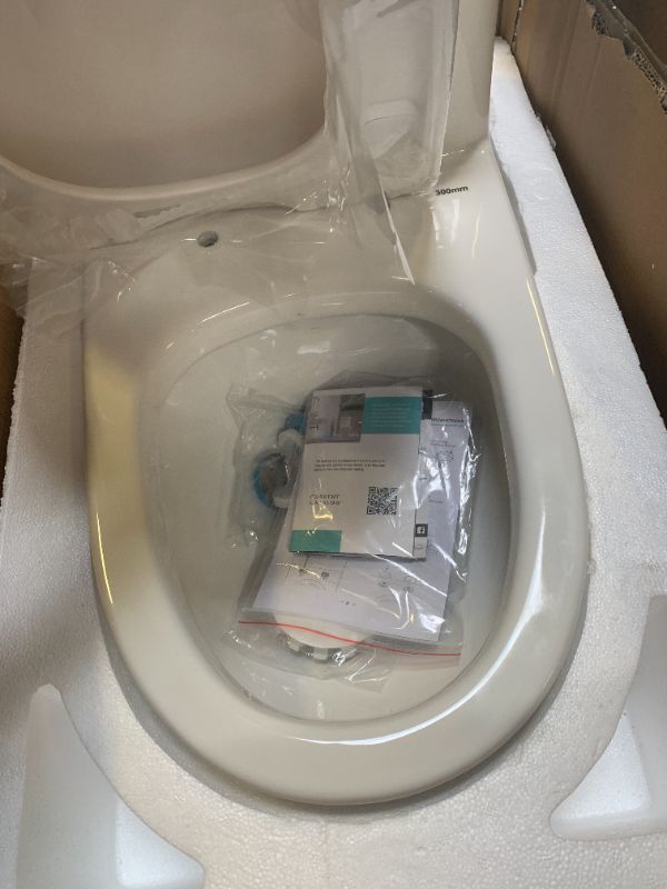 Photo 1 of Swiss Madison SM-1T257 Sublime II Compact 24" Length One Piece Toilet Dual Flush 1.1/1.6 GPF with Side Holes, Glossy White