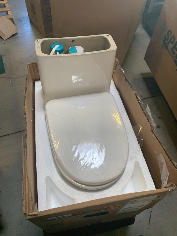 Photo 1 of Swiss Madison SM-1T257 Sublime II Compact 24" Length One Piece Toilet Dual Flush 1.1/1.6 GPF with Side Holes, Glossy White