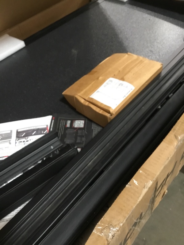 Photo 1 of (Used)(damaged)Rough Country Hard Flip-Up Truck Bed Tonneau Cover for Toyota Tundra (2022-2025) - Aluminum Tri-Fold Bed Cover, Fits 5'7" (65.6") Bed