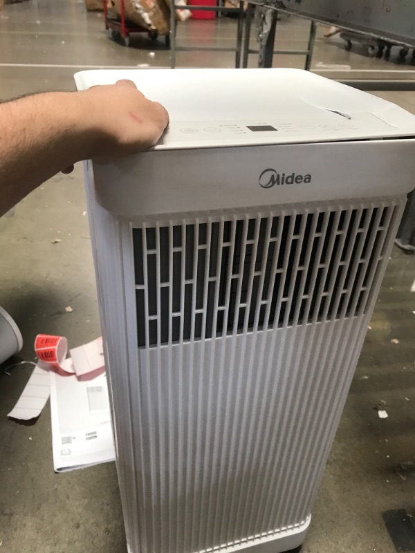Photo 1 of ***************MISSING REMOTE/MINOR DAMAGE**********
Midea 8,500 BTU ASHRAE (5,000 BTU SACC) Portable Air Conditioner, Smart Control, Cools up to 150 Sq. Ft., with Dehumidifier & Fan mode, Easy- to-use Remote Control & Window Installation Kit Included