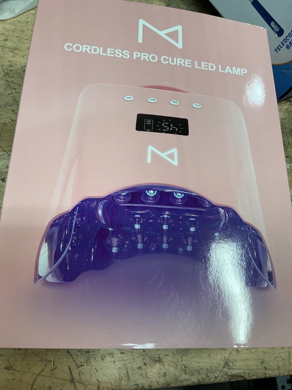 Photo 1 of (MISSING POWER CORD)M - NEO Cordless & Rechargeable Nail Curing Lamp 78W with 4 LCD Time Display Timer, Auto Sensor, and Spacious Interior for All Hand Sizes and Nail Lengths (Pink)