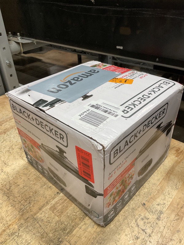 Photo 1 of BLACK+DECKER 6-Cup Rice Cooker, RC506, 3-cup Uncooked Rice, Steaming Basket, Removable Non-Stick Bowl, One Touch