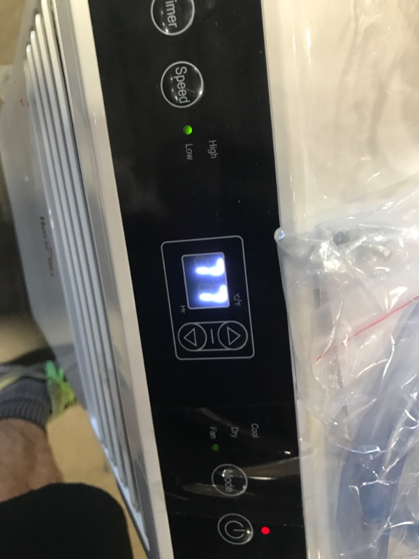 Photo 1 of 10,000 BTU Portable Air Conditioner Cools 200 Sq. Ft. with Dehumidifier, Ventilating and Remote Control in White


