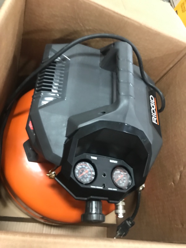 Photo 1 of *************APEARS NON-FUNCTIONAL************
RIDGID 6 Gal. 150 PSI Portable Electric Pancake Air Compressor 02106416