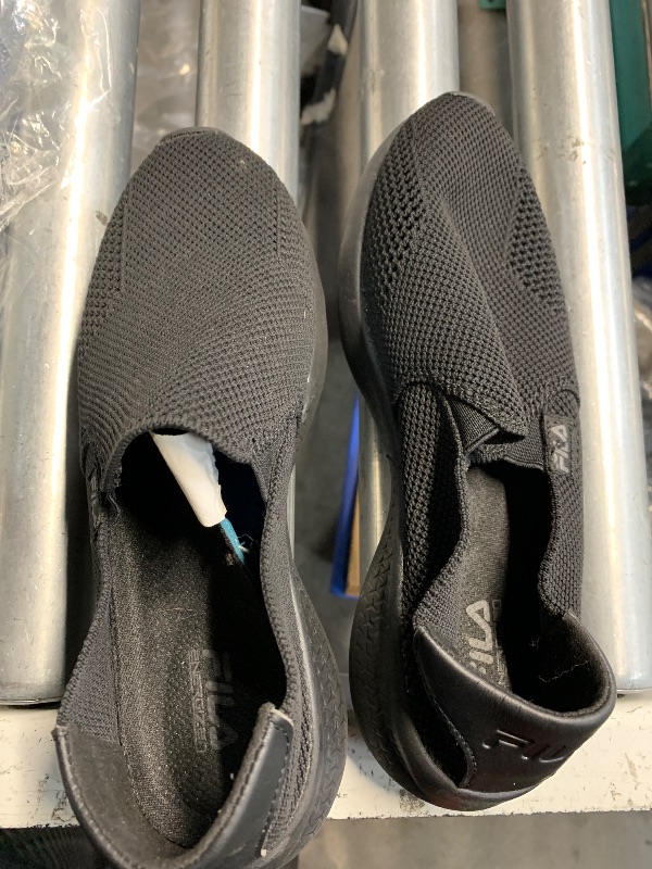Photo 1 of ***(HEAVILY USED)***''FILA SLIP ON SHOES SIZE 7 BLACK 