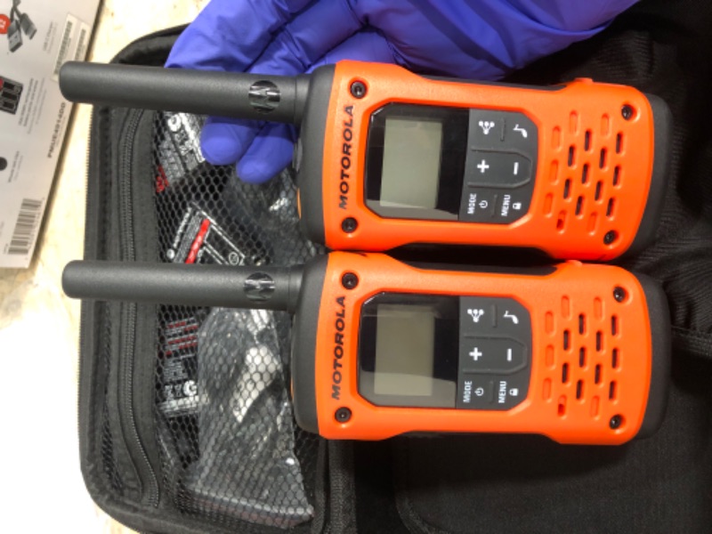 Photo 1 of (ONLY ONE POWERS ON) (PARTIAL SET) Motorola Solutions, Portable FRS, T605_H2O, Talkabout, Two-Way Radios Walkie Talkie Emergency Preparedness, Rechargeable, 22 Channel, 35 Mile, Orange W/Black, 2 Pack