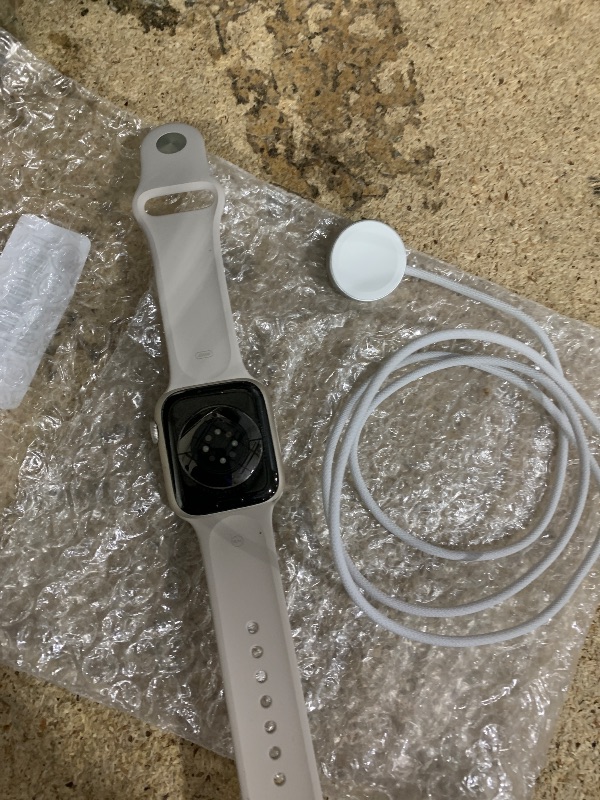 Photo 1 of *NOT ON ORIGINAL PACKAGE* Apple Watch Series 9 [GPS 45mm] Smartwatch with Starlight Aluminum Case with Starlight Sport Band S/M. Fitness Tracker, ECG Apps, Always-On Retina Display, Water Resistant