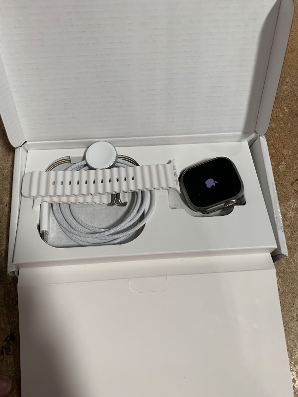 Photo 1 of Apple Watch Ultra [GPS + Cellular 49mm] Titanium Case with White Ocean Band, One Size (Renewed Premium)