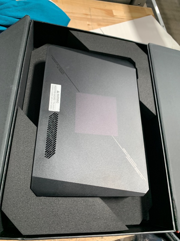 Photo 1 of ROG NUC 760 Full System Mini PC with Intel 14th Gen Core Ultra 7 155H, NVIDIA GeForce RTX 4060 Graphics, 16GB DDR5 RAM, 1TB PCIe G4x4 NVMe SSD, Win 11, ARGB Lighting, with Vertical Stand Included