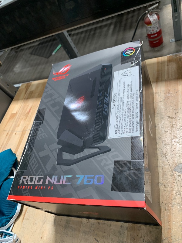 Photo 1 of ROG NUC 760 Full System Mini PC with Intel 14th Gen Core Ultra 7 155H, NVIDIA GeForce RTX 4060 Graphics, 16GB DDR5 RAM, 1TB PCIe G4x4 NVMe SSD, Win 11, ARGB Lighting, with Vertical Stand Included