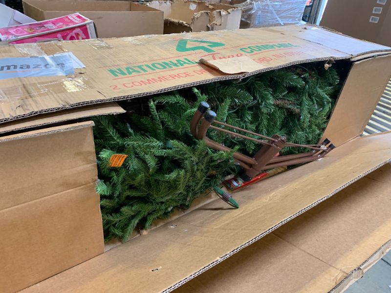 Photo 1 of National Tree Company Pre-Lit 'Feel Real' Artificial Full Christmas Tree, Green, Frasier Grande, Dual Color LED Lights, Includes Stand, 7.5 Feet