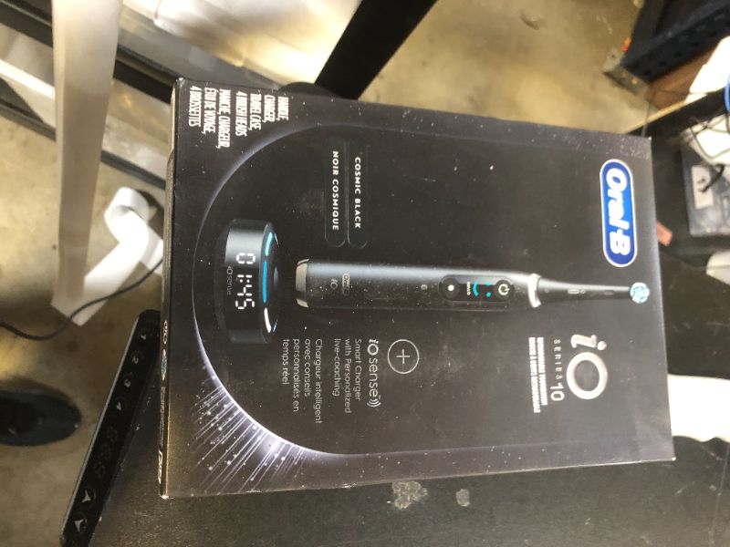 Photo 1 of Oral-B iO Series 10 Rechargeable Electric Toothbrush with Visible Pressure Sensor to Protect Gums, 2 Min Timer, 7 Cleaning Settings, 4 Replacement Toothbrush Heads, and Charging Travel Case, Black