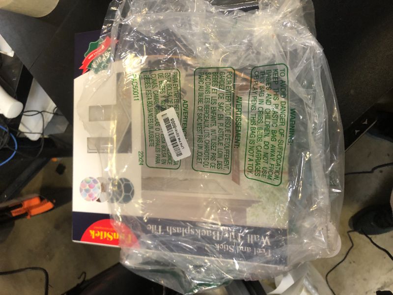 Photo 1 of STICKGOO Backsplash Peel and Stick Tile, 2021 Upgraded Version with Stronger Adhesive, Stick on Backsplash for Kitchen Bathroom Laundry(10 Sheets, Black&Brown)