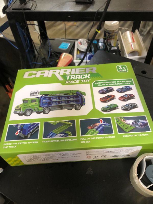 Photo 1 of Toddler Car Truck Toys,Car Carrier Truck Toys for Kids Age 3-5 4-8,Foldable Car Track Sets with 2.8-Ft Race Track and 6 Die-Cast Race Cars, Truck Toys Gifts for 3 4 5 6 7 8+ Year Old Boys Girls(Green)