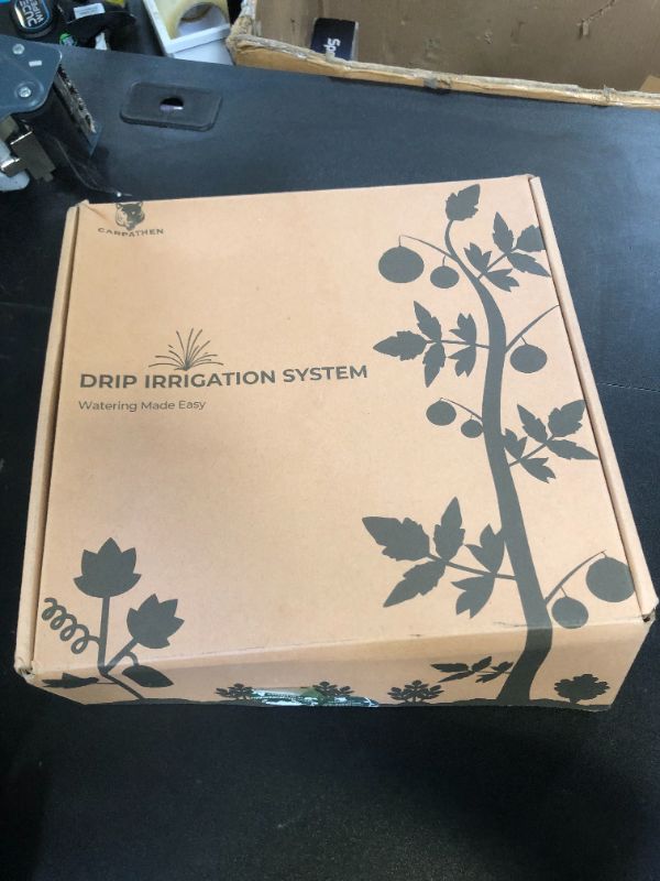 Photo 1 of CARPATHEN Drip Irrigation System - Adjustable Premium Irrigation System for Garden, Raised Beds - Complete Drip Irrigation Kit with Drip Emitters, 5/16" and 1/4" Irrigation Tubing and Barbed Fittings