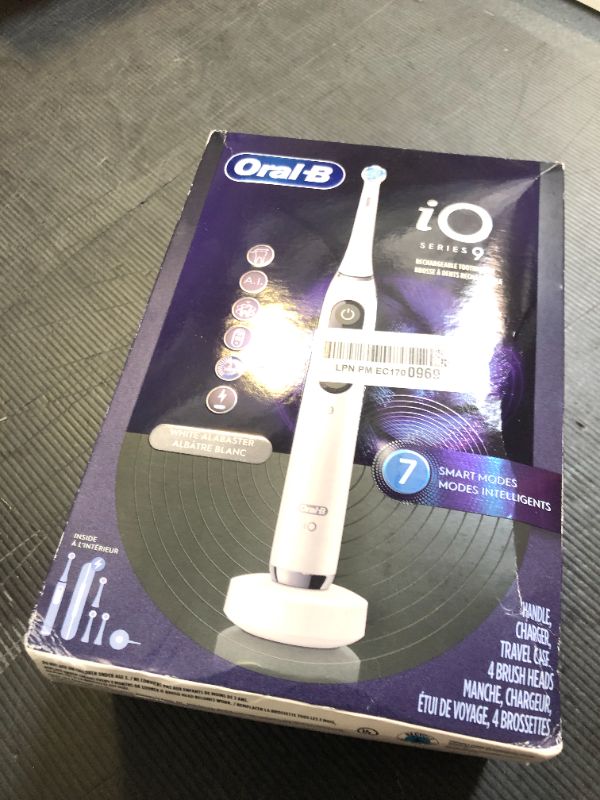 Photo 1 of Oral-B iO Series 9 Electric Toothbrush with 3 Replacement Brush Heads, White Alabaster