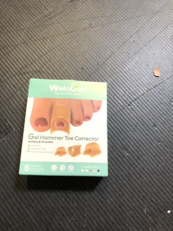 Photo 1 of Welnove Hammertoe Corrector - 6 Pack Toe Splints - Soft Gel Toe Straighteners - Realign Bent, Curled, Crooked, Claw, Hammer Toes - Toe Corrector for Men and Women, 3 Different Sizes (Beige)