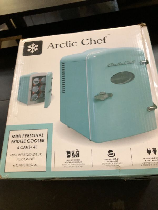 Photo 1 of ARCTIC CHEF ACMIS129- CP4 RMIS129-BLUE Mini Retro 6 Can Beverage Refrigerator-Blue,0.14 Cubic feet