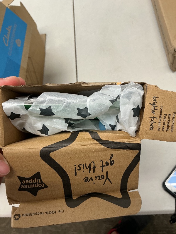 Photo 3 of Tommee Tippee Ultra-Light Silicone Pacifier, 6-18 Months, Symmetrical One-Piece Design, BPA-Free Silicone Binkies, Clear/Blue/Yellow, Pack of 4