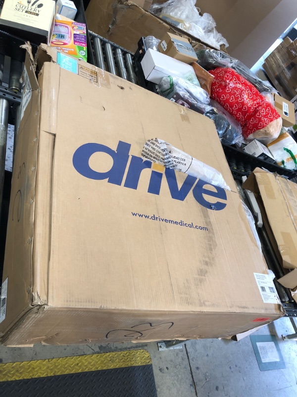 Photo 1 of Drive Medical BLS18FBD-ELR Blue Streak Lightweight Wheelchair with Swing-Away Elevating Leg Rests and Flip-Back Arms