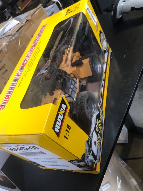 Photo 1 of Fistone 9 Channel RC Front Loader, 4WD Alloy Shovel Loader Tractor, 2.4Ghz RC Bulldozer Construction Vehicle Radio Control Tractor Truck Toy with Lights for Kids Age 8-12 Years Old