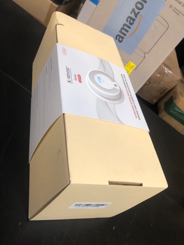 Photo 1 of X-Sense Wireless Interconnected Combination Smoke and Carbon Monoxide Detector with LCD Display & 10-Year Battery, Over 820 ft Transmission Range, 6-Pack
