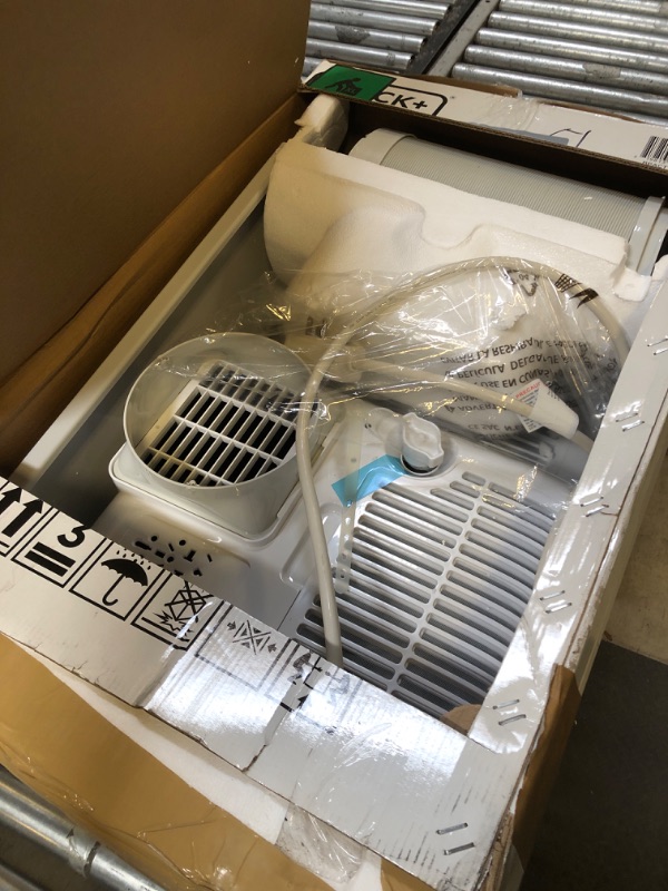 Photo 1 of BLACK+DECKER 10,000 BTU Portable Air Conditioner up to 450 Sq. with Remote Control, White