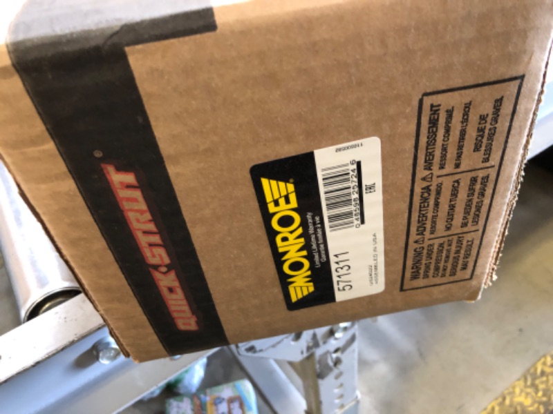 Photo 1 of Monroe Quick-Strut 571311 Suspension Strut and Coil Spring Assembly for Chrysler Sebring