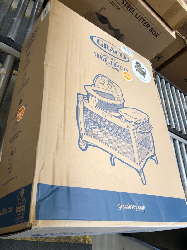 Photo 1 of Graco Pack n Play Dome LX Playard with Baby Bassinet, Lightweight Portable Crib, Push-Button Fold Travel Crib, Redmond, Convertible