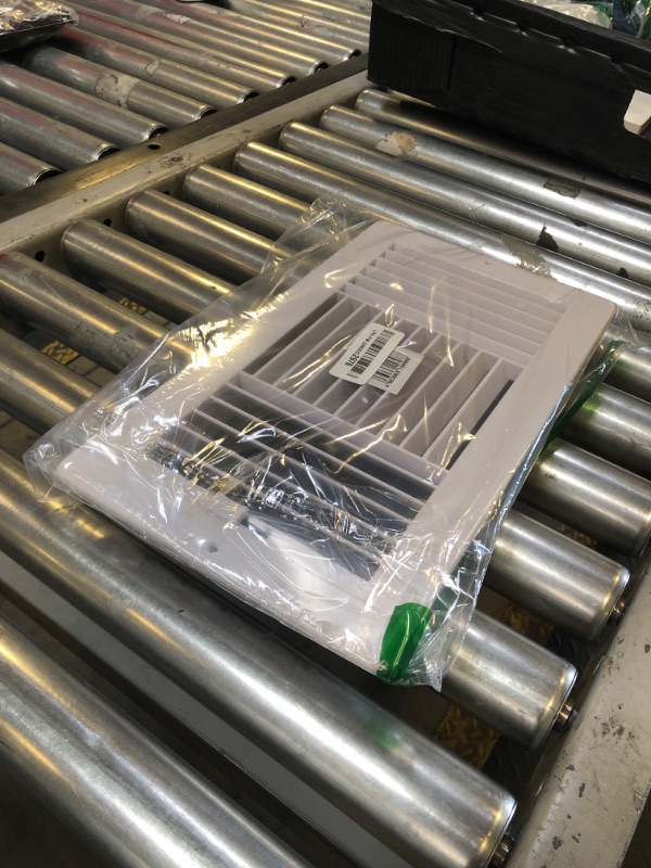 Photo 1 of Three-Way Plastic Side Wall/Ceiling Register in White 12" w X 6" h for Duct Opening (Outside Dimension is 13.75" w X 8" h)