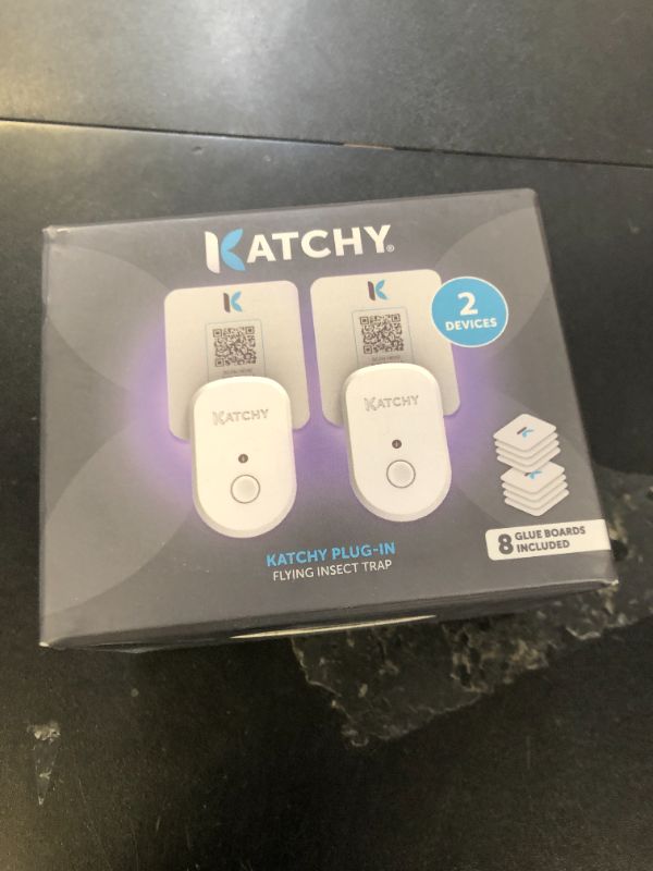 Photo 1 of KATCHY Indoor Plug-in Insect Trap - Catcher & Killer for House Flies, Mosquitoes, Fruit Flies, Gnants, and Mosquitos - Chemical-Free, Eco-Friendly, Easy to Clean (2 Pack with 8 Glue Boards)