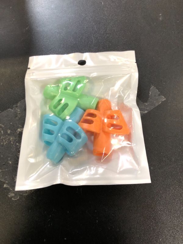 Photo 1 of JuneLsy Pencil Grips for Kids Handwriting Pencil gripper Pencil Holder Posture Correction Training Writing AIDS for preschooler Kids toddler Children Special Needs (3 PCS)