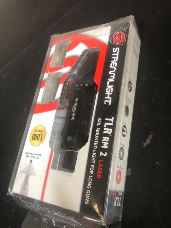 Photo 1 of Streamlight 69448 TLR RM 2 1000-Lumen Rail-Mounted Tactical Weapon Light with Integrated Red Aiming Laser, and Key Kit, Black