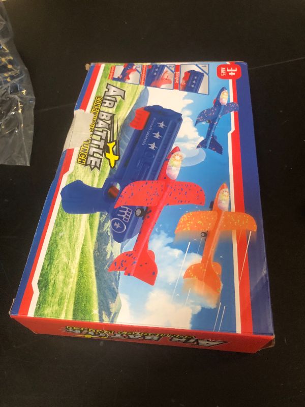 Photo 1 of LJZJ 3 Pack Airplane Launcher Toys, 2 Flight Modes LED Foam Glider Catapult Plane, Outdoor Flying Toy for Kids, Birthday Gifts for Boy Girl 6+ Year Old, B-Day Party Supplies