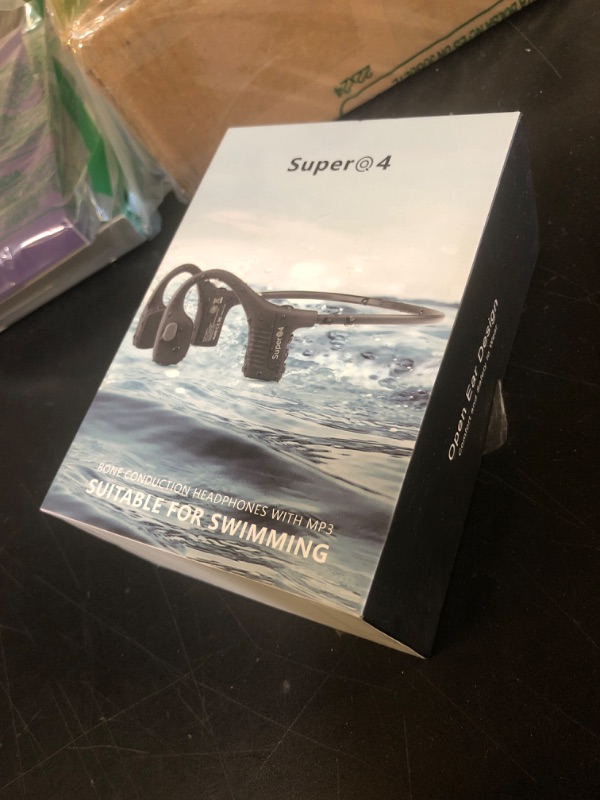Photo 1 of Bone conduction headphones swimming underwater IPX8 waterproof headsets bluetooth wireless built in 32GB MP3 player multi-point connection magnetic charging 240mAh large battery for 12 Hrs playtime