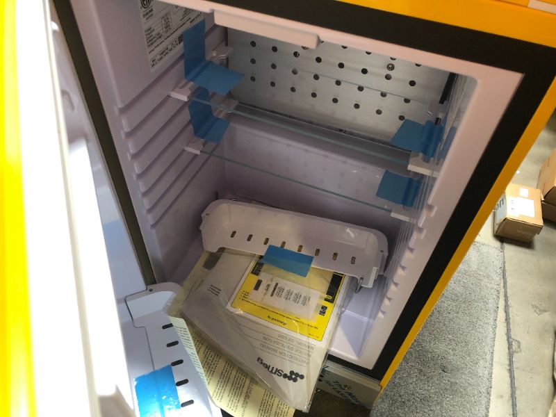 Photo 1 of Smeg FAB5URYW3 16" 50's Retro Style Series Compact Cooler with 1.5 cu. ft. Capacity Automatic Defrost LED Interior Lighting and Adjustable Shelves Yellow, Right Hand Hinge Made In Italy
